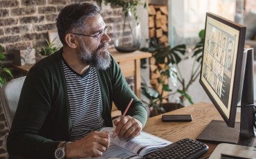 Man working on desktop computer.